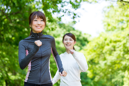 young asian women jogging in the park